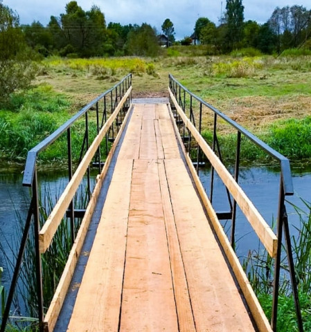 Выполнен ремонт моста через реку Съежа